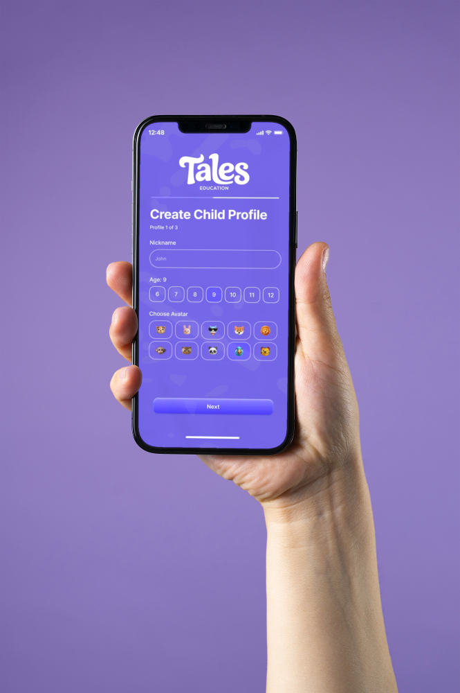 Hand holding Tales Education